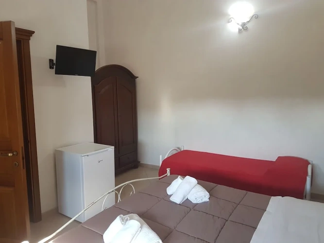 Standard Triple room with garden view