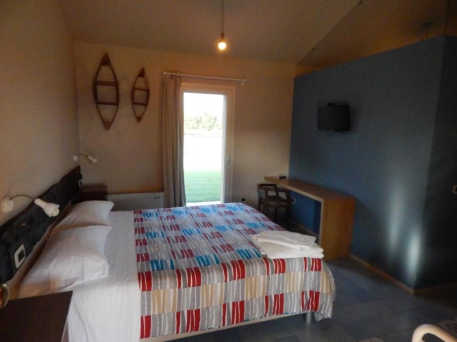 Standard Triple room with garden view