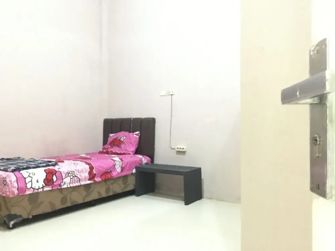 Oyo 1883 Mulia Tiza