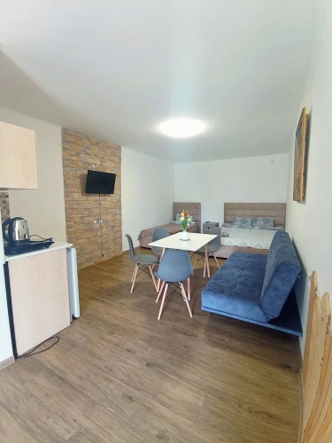 Standard Triple room with garden view