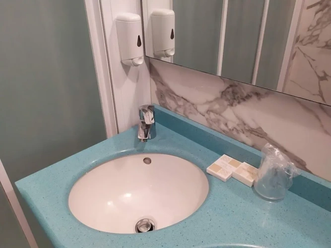 Standard Quadruple room with partial sea view