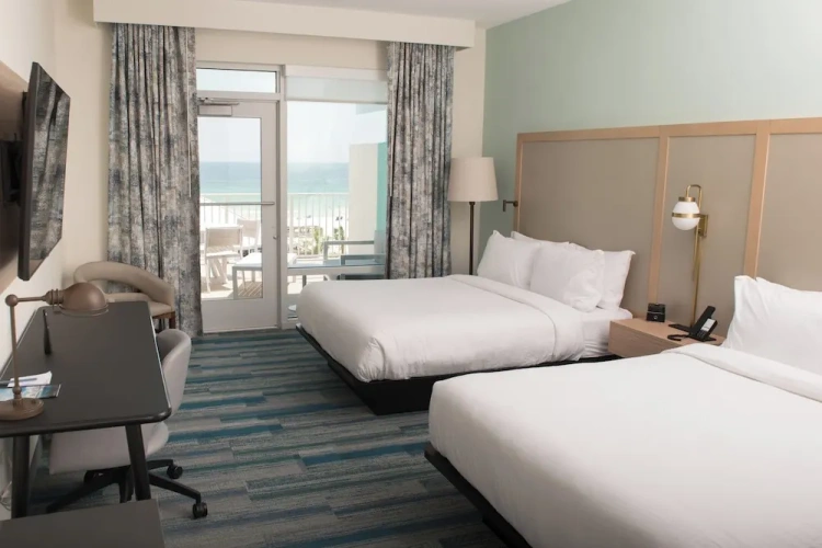 Standard Quadruple room with balcony and beachfront