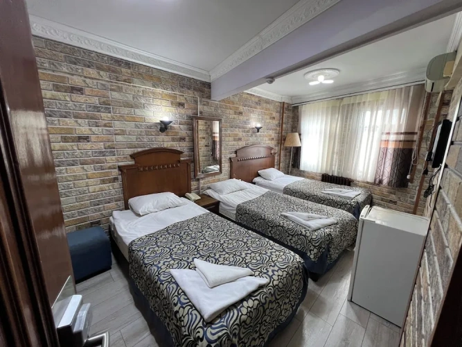 Standard Triple room with sea view