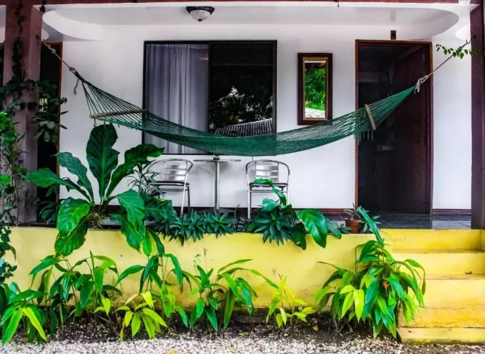 Standard Triple room with garden view