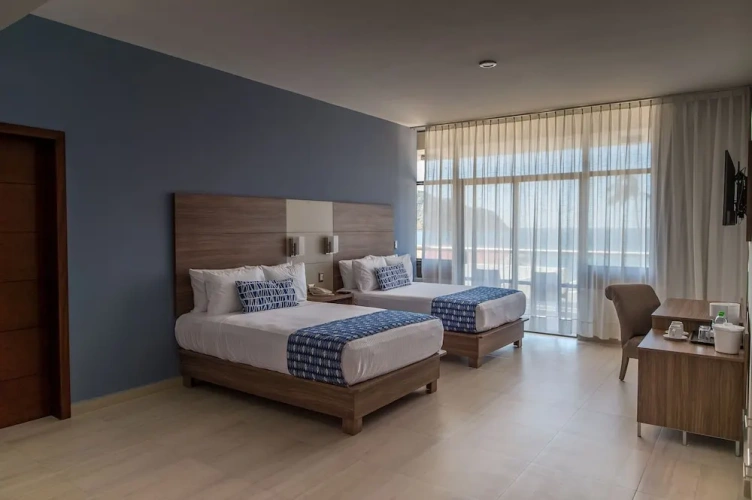 Standard Quadruple room with balcony and with sea view