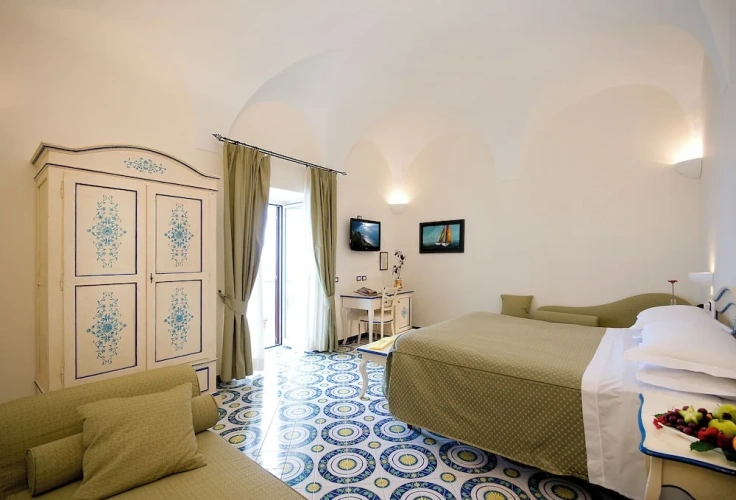 Deluxe Quadruple room with balcony and with sea view