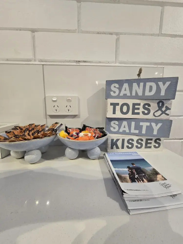 Sandy Toes and Salty Kisses