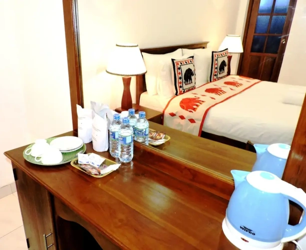 Deluxe Triple room with garden view