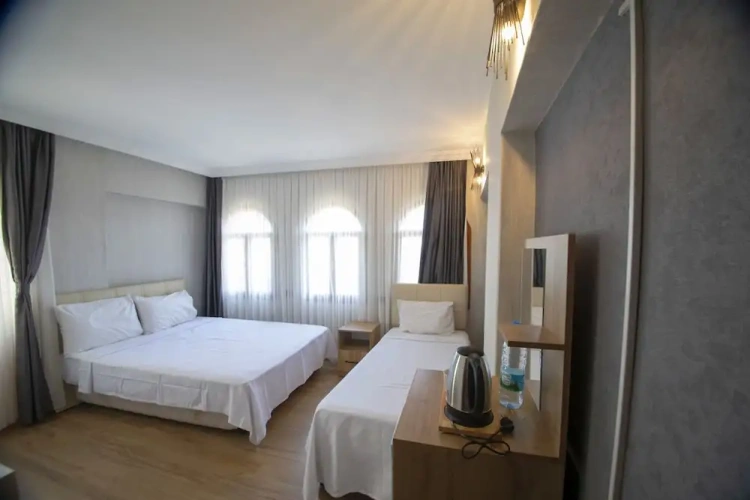 Standard Triple room with balcony and with city view