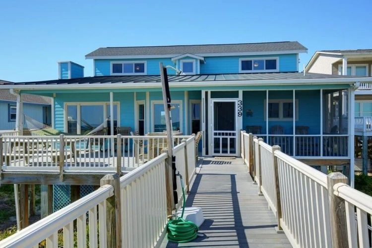 Windchimes 4 Bedroom Home by RedAwning