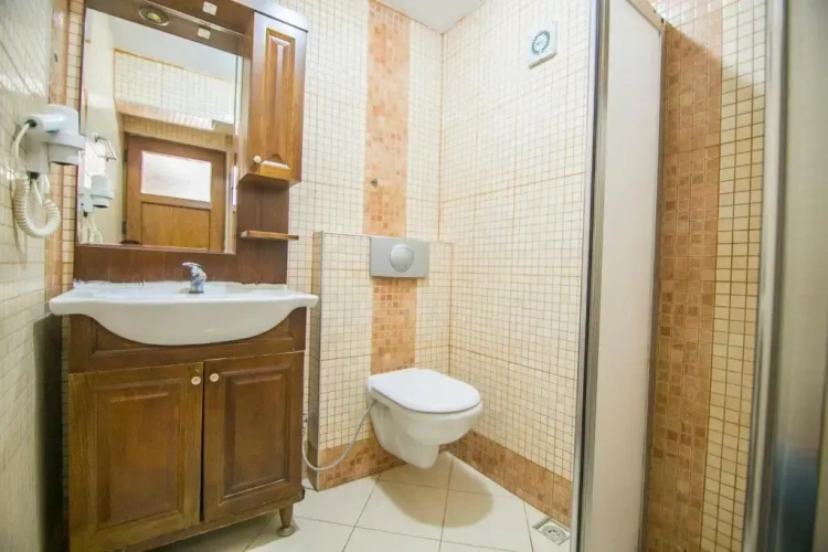 Standard Triple room with garden view