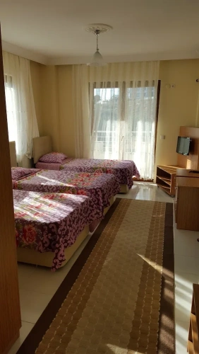 Standard Quadruple room with balcony and with garden view