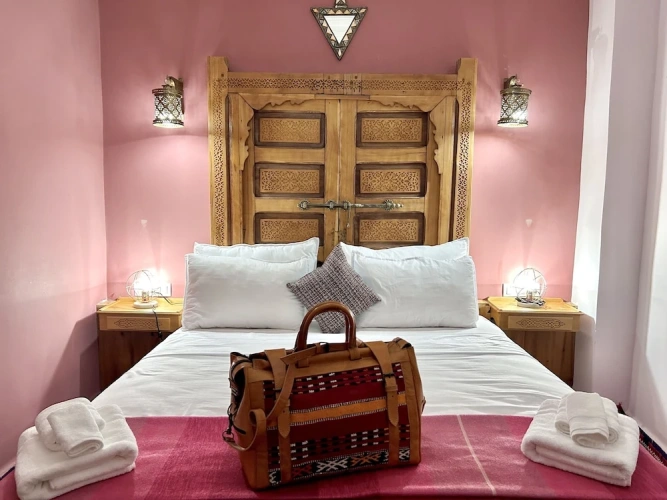 Grand Quadruple room with balcony and with courtyard view