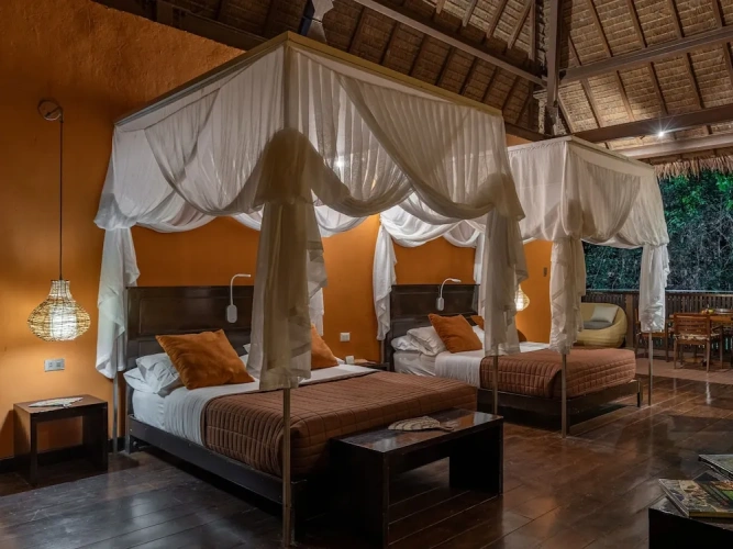 Deluxe Quadruple Suite with balcony and with garden view