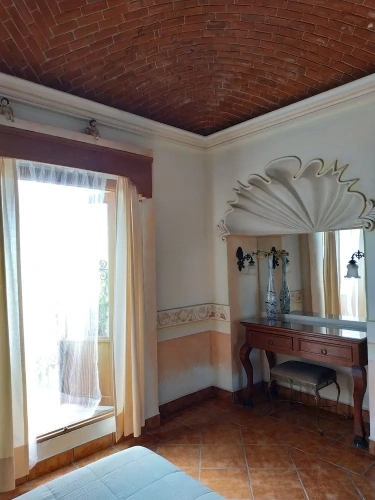 Standard Quadruple Family room with balcony and with courtyard view