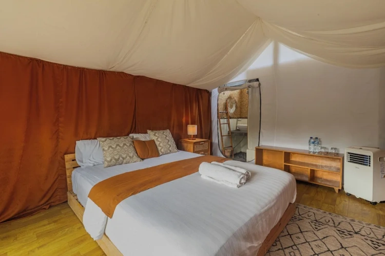 Tent with balcony and with river view