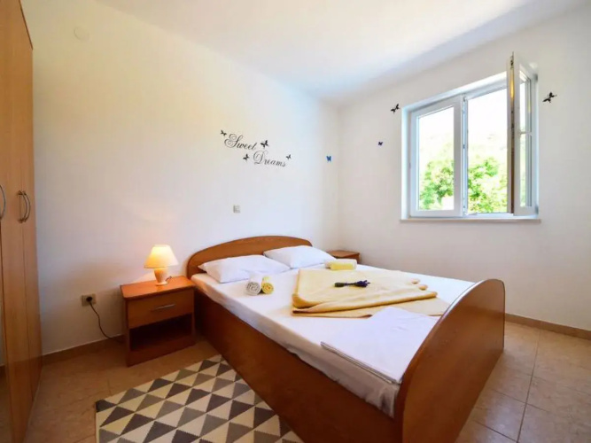 Apartment Sani Karlobag 30011
