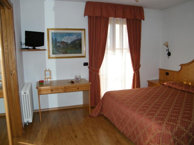 Standard Quadruple room with balcony and with garden view