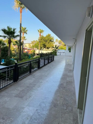 Standard Triple room with balcony and with garden view