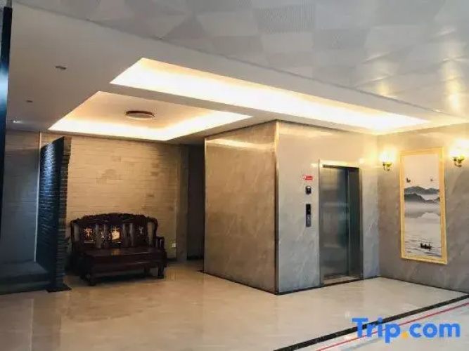 Pingle Xingfu Hotel