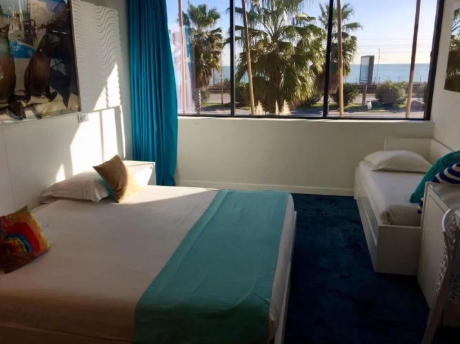 Standard Triple room with sea view