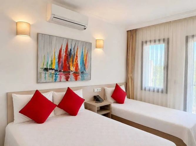 Standard Triple room with balcony