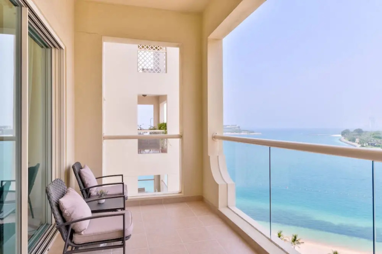 Shoreline Beachfront Luxury Palm