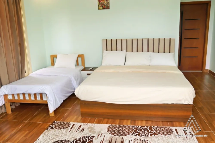 Deluxe Triple room with balcony and with garden view