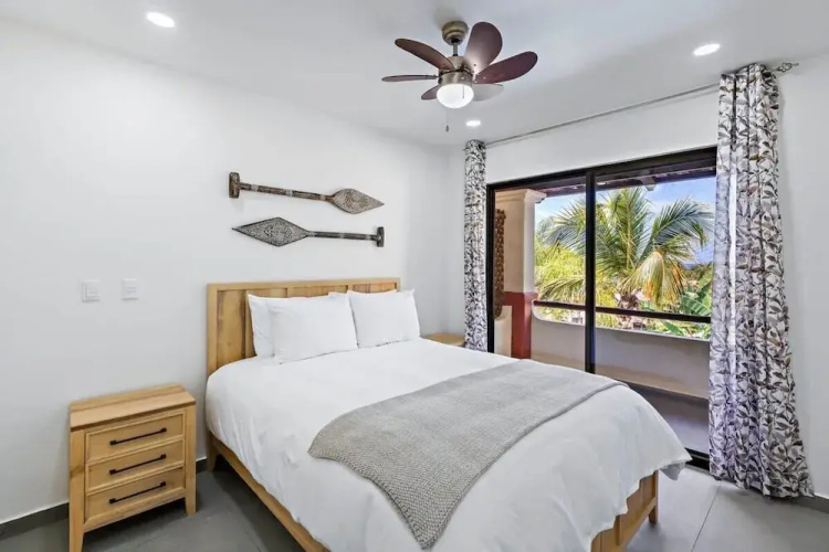 Modern Split-Level 2-Bedroom Condo with Pools, Terrace & Easy Beach Access