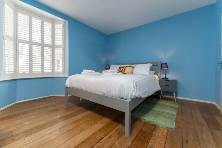 Host Stay Blue Hues on Over Street