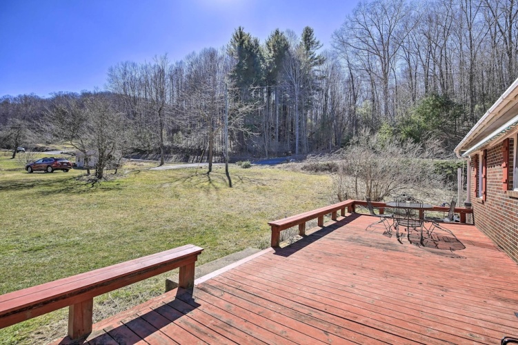 Quaint Creekside Home w/ Spacious Deck & Yard