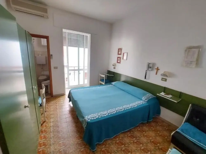 Standard Quadruple room with balcony and with garden view