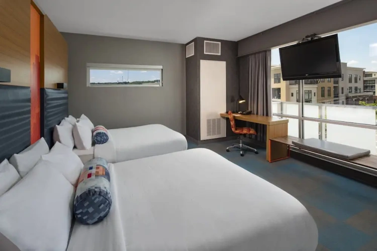 Standard Quadruple room with balcony and with city view