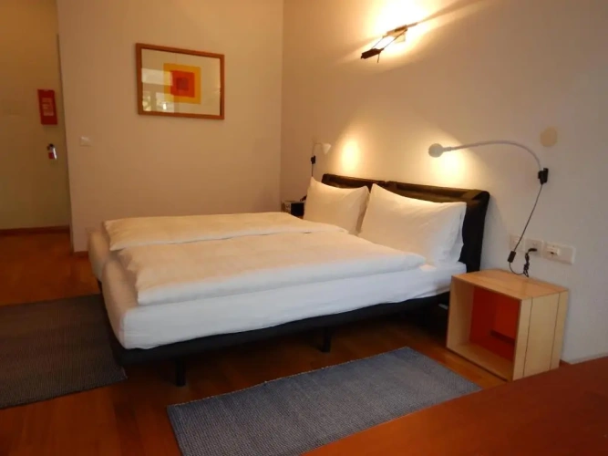 Standard Triple room with garden view