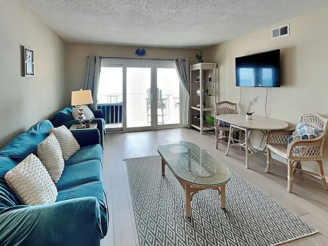A Wave From It All by Topsail Realty