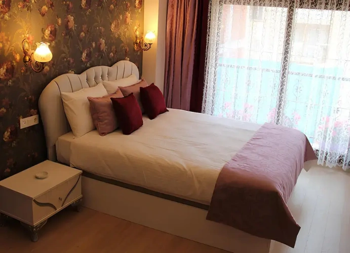 Deluxe Quadruple room with balcony
