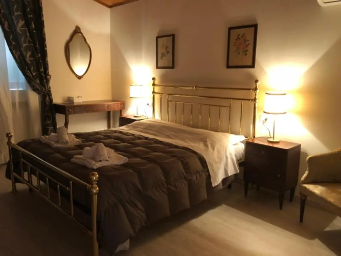 Standard Triple room with garden view