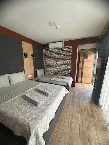 Standard Triple room with garden view