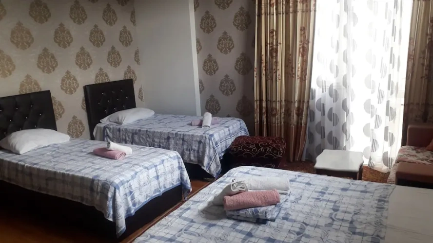 Standard Quadruple room with city view