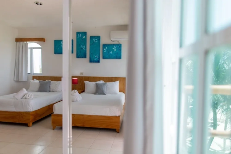 Deluxe Quadruple room with partial ocean view