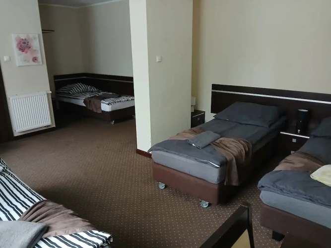 Standard Quadruple room with garden view