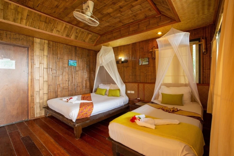 Standard Triple room with balcony and with garden view