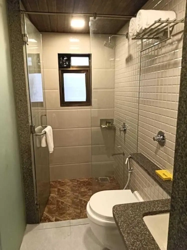 Deluxe Quadruple room with courtyard view