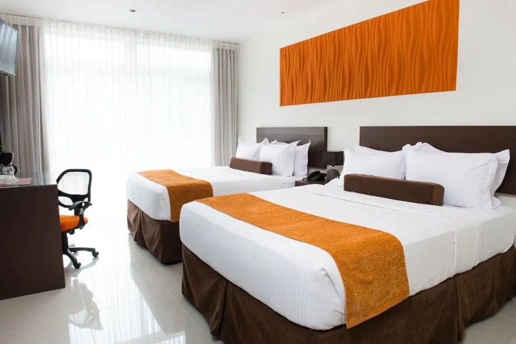 Comfort Quadruple room with pool view
