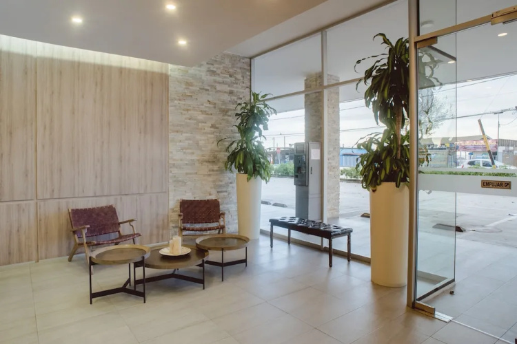 Contemporary apartment w/ a full kitchen, ocean views, & rooftop deck