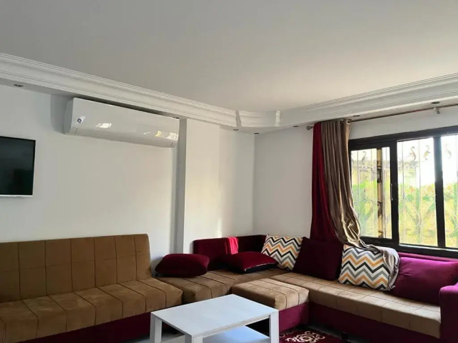 Comfortable apartment with a private garden near AUC شقه فندقيه