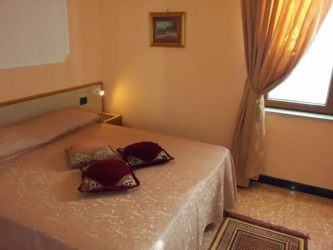 Standard Triple room with balcony and with garden view