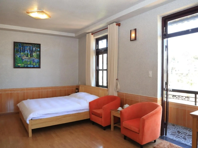 Deluxe Quadruple room with balcony and with view