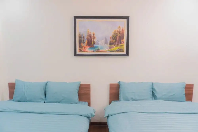 Deluxe Quadruple room with balcony and with city view