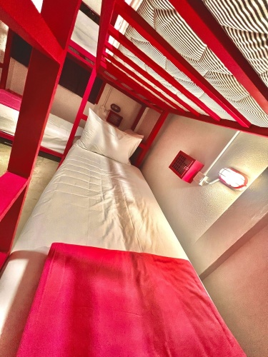 Bed in Dorm with pool view